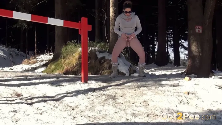 Outdoor Pissing Porn: Brunette Streams Urine Into Fresh Snow - popular fetish video on HighTide